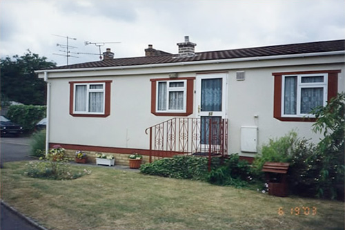 Exterior redecoration to bungalow including railings