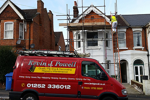 Working in a victorian property exterior, fitting and painting decorative gable-end, Aldershot