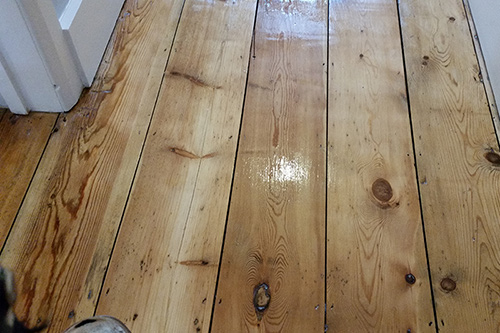 Floor finished with 3 coats of satin clear varnish