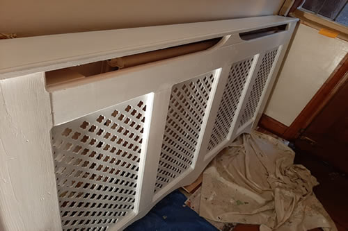 Radiator cover, from brown to white, eggshell finish.
