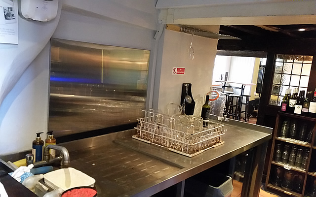 Supply and fit of stainless steel splashback to part of the kitchen