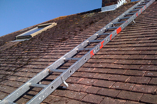 Roof after moss cleaned off and removed
