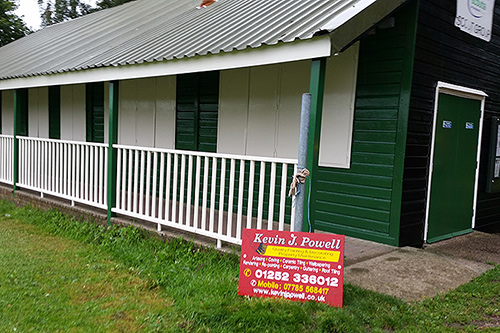 Exterior redecoration to scout hut (railings sprayed using high volume low pressure)