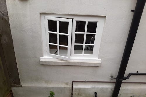 Window repairs, refurbishment and painted in specialists paint, to a Grade 2 listed property