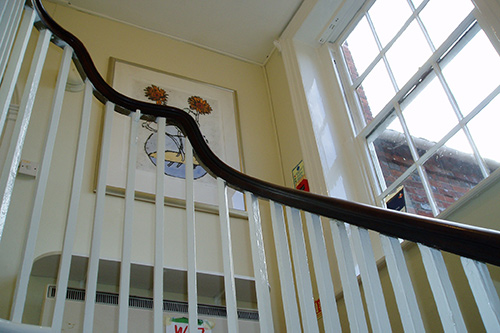 Walls with sash windows and high gloss spindles